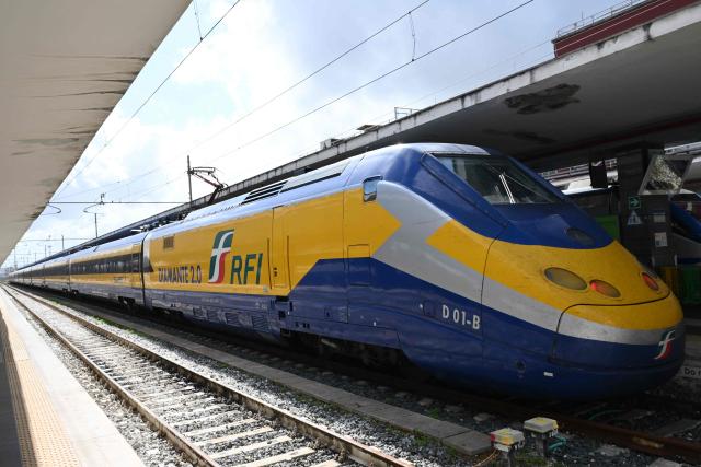 A photo shows a diagnostic train named Diamante 2.0 which reaches a speed of 300 km/h and inspects high-speed lines, in Naples trains station on May 15, 2026. Diamante 2.0 is a train in the Rete Ferroviaria Italiana (RFI) fleet; the special train uses 98 cameras and over 200 sensors placed on the roof and on the trolleys near the wheels to monitor over 500 parameters to collect data on the infrastructure, useful for promptly eliminating possible causes of anomalies and for supporting the scheduling and planning of maintenance operations to be carried out. (Photo by Alberto PIZZOLI / AFP)