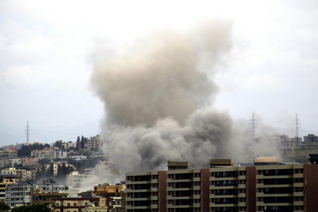 Smoke rises from the site of an Israeli airstrike that targeted a neighbourhood in the southern Lebanese city of Tyre on May 15, 2026. Israel's military called on residents of five villages in southern Lebanon to immediately evacuate on May 15, ahead of expected attacks against Hezbollah, despite a truce with Lebanon intended to halt the fighting. Israel has pounded Lebanon and invaded its south in response to retaliatory fire from Shia movement Hezbollah following Israel's killing of Iran's supreme leader at the start of the war on February 28. (Photo by KAWANT HAJU / AFP)