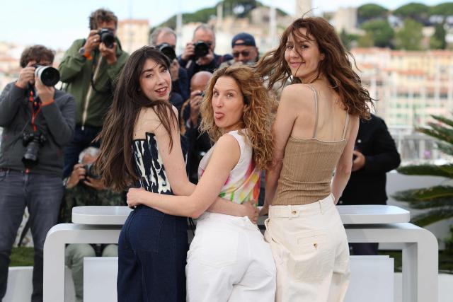 French actress Suzanne De Baecque, French actress Julia Piaton and French actress Doria Tillier pose during a photocall of the film "Les Caprices de l’Enfant Roi" at the 79th edition of the Cannes Film Festival in Cannes, southern France on May 15, 2026. (Photo by Thibaud MORITZ / AFP)