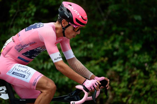 Bahrain - Victorious Portuguese rider Afonso Eulalio wearing the overall leader's pink jersey (Maglia Rosa) rides during the 7th stage of the Giro d'Italia 2026 - Tour of Italy cycling race between Formia and Blockhaus, Italy, on May 15, 2026. (Photo by Luca Bettini / AFP)