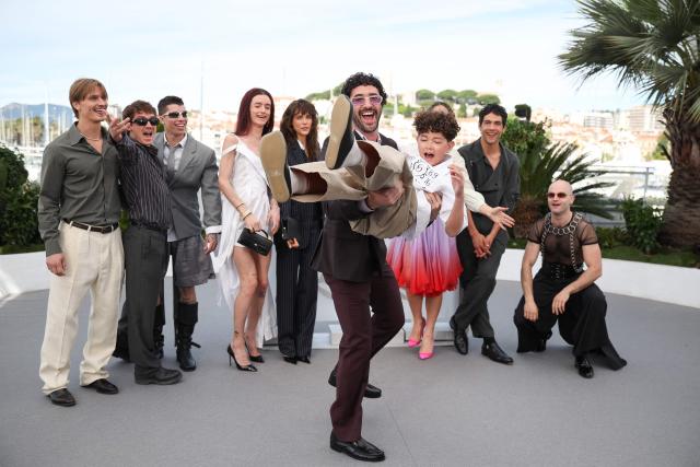 (From L) US director and screenwriter Jordan Firstman holds British actor Reggie Absolom during a photocall of the film "Club Kid" at the 79th edition of the Cannes Film Festival in Cannes, southern France on May 15, 2026. (Photo by Valery HACHE / AFP)