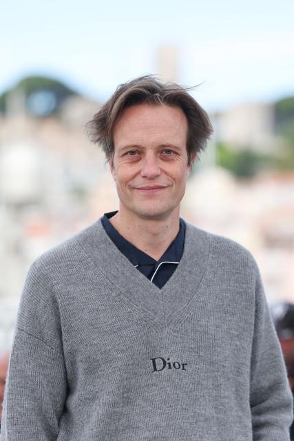German actor August Diehl poses during a photocall of the film "Fatherland" at the 79th edition of the Cannes Film Festival in Cannes, southern France on May 15, 2026. (Photo by Thibaud MORITZ / AFP)