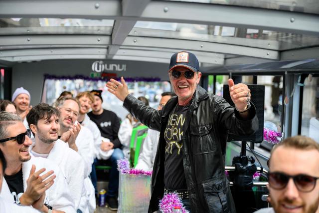 German DJ John Juergens greets members of the ESC Fan Club in Vienna, on  May 15, 2026, on the eve of the 2026 Eurovision Song Contest (ESC) final. (Photo by MAX SLOVENCIK / APA / AFP) / Austria OUT