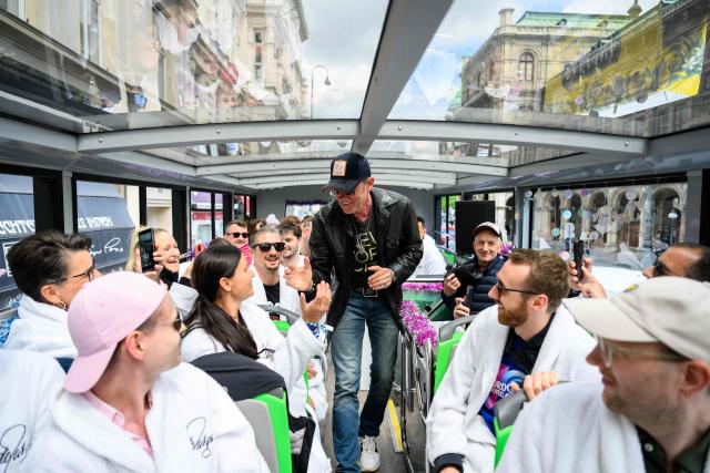 German DJ John Juergens greets members of the ESC Fan Club in Vienna, on  May 15, 2026, on the eve of the 2026 Eurovision Song Contest (ESC) final. (Photo by MAX SLOVENCIK / APA / AFP) / Austria OUT