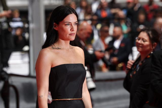 US director and actress Riley Keough arrives for the screening of the film "Soudain" (All of a Sudden) at the 79th edition of the Cannes Film Festival in Cannes, southern France on May 15, 2026. (Photo by Sameer AL-DOUMY / AFP)