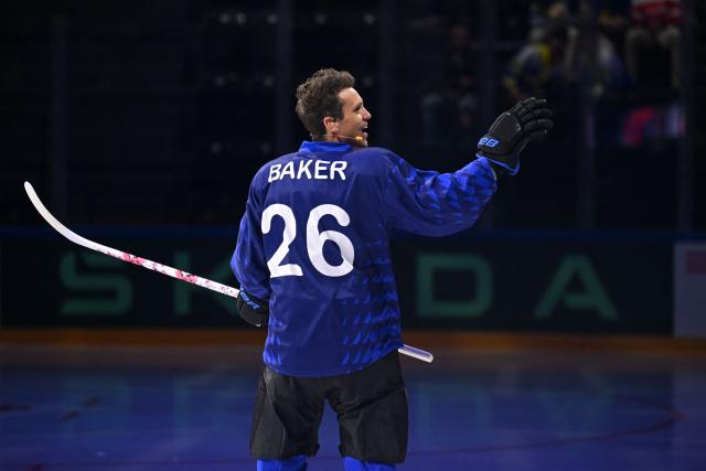 Swiss singer-songwriter Bastian Baker performs the opening song prior to the groupe B match between Canada and Sweden at the IIHF Ice Hockey Men's World Championship at BFC Arena, in Fribourg on May 15, 2026. (Photo by Fabrice COFFRINI / AFP)