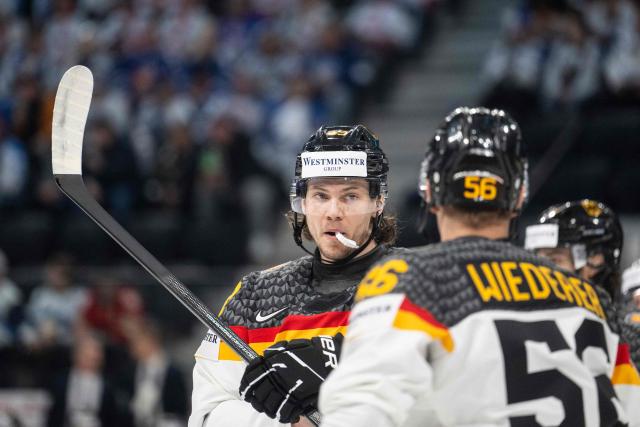 Germany's defender #53 Moritz Seider (C) reacts during the group A match between Finland and Germany at the IIHF Ice Hockey Men's World Championship at Swiss Life Arena, in Zurich on May 15, 2026. (Photo by ENNIO LEANZA / AFP)