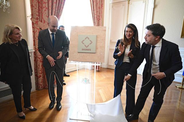 (LtoR) France's Culture Minister Catherine Pegard, Foreign Minister Jean-Noel Barrot, Junior Minister for Education Sabrina Agresti-Roubache and Marseille Mayor Benoit Payan unveil a plaque marking the labelling of the Palais du Pharo site as "Heritage of Diplomacy" (Patrimoine de la diplomatie) at the Palais du Pharo in Marseille on May 15, 2026. (Photo by Miguel MEDINA / AFP)