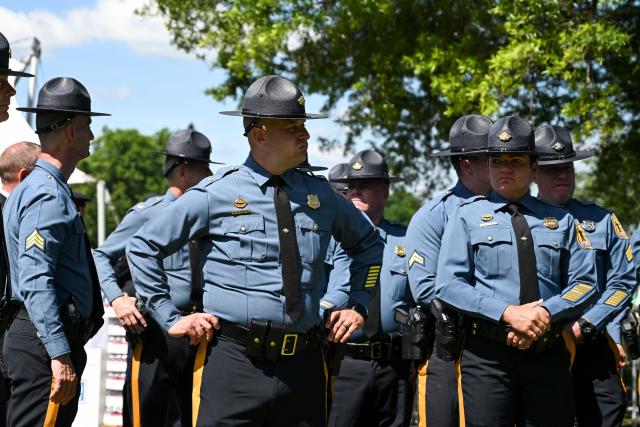 Police officers attend the National Peace Officers' Memorial Service, ahead of the arrival of US Vice President JD Vance, outside the US Capitol in Washington, DC, on May 15, 2026. The annual event honors law enforcement officers who died in the line of duty. (Photo by Alex WROBLEWSKI / AFP)