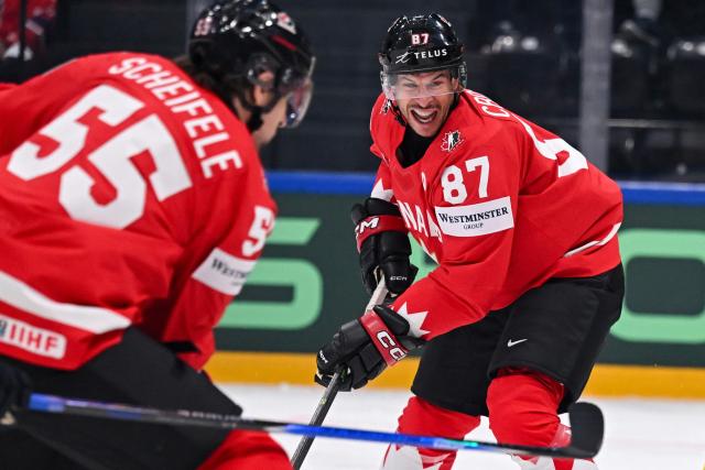 Canada’s forward #87 Sidney Crosby reacts during the IIHF Ice Hockey Men's World Championship first round group B ice hockey match between Canada and Sweden at the BFC Arena, in Fribourg, Switzerland on May 15, 2026. (Photo by Fabrice COFFRINI / AFP)