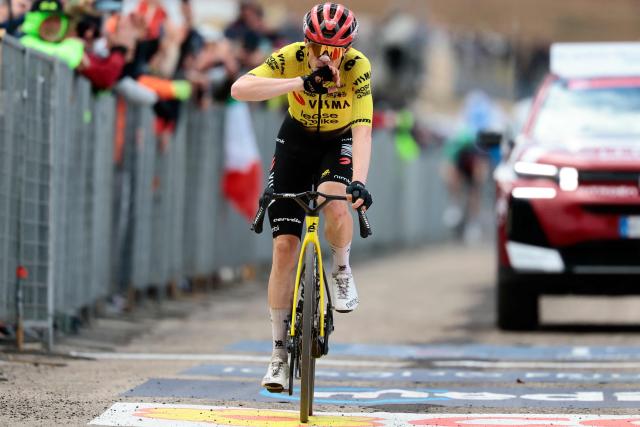 Team Visma Lease a Bike Danish rider Jonas Vingegaard celebrates as he crosses the finish line to win the 7th stage of the Giro d'Italia 2026 - Tour of Italy cycling race between Formia and Blockhaus, Italy, on May 15, 2026. (Photo by Luca Bettini / AFP)