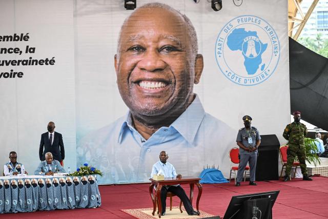 Former Ivorian President and Chairman of the African People's Party of Ivory Coast (PPA-CI) Laurent Gbagbo (C) reacts during the closing ceremony of his Party's first Congress in Abidjan on May 15, 2026. (Photo by Issouf SANOGO / AFP)