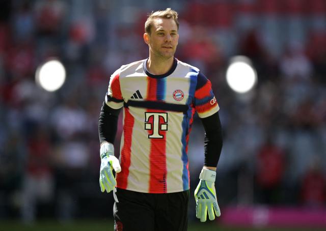(FILES) Bayern Munich's German goalkeeper #01 Manuel Neuer warms up ahead the German first division Bundesliga football match between FC Bayern Munich and Heidenheim in Munich on May 2, 2026. Bayern Munich veteran Manuel Neuer announced on May 15, 2026 that he has extended his contract at the German champions by one year until 2027. The 40-year-old goalkeeper's deal was set to expire in the summer but he will stay on in Munich for what will be a 16th year at the Bavarian giants. (Photo by Alexandra BEIER / AFP) / DFL REGULATIONS PROHIBIT ANY USE OF PHOTOGRAPHS AS IMAGE SEQUENCES AND/OR QUASI-VIDEO