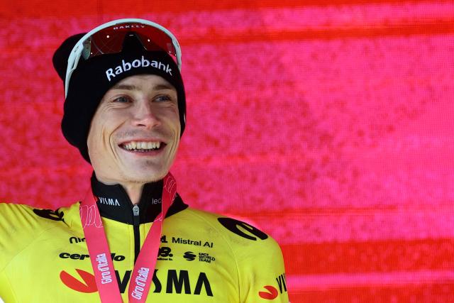 Team Visma Lease a Bike Danish rider Jonas Vingegaard poses on the podium after winning the 7th stage of the Giro d'Italia 2026 - Tour of Italy cycling race between Formia and Blockhaus, Italy, on May 15, 2026. (Photo by Luca Bettini / AFP)