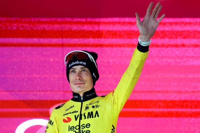 Team Visma Lease a Bike Danish rider Jonas Vingegaard poses on the podium after winning the 7th stage of the Giro d'Italia 2026 - Tour of Italy cycling race between Formia and Blockhaus, Italy, on May 15, 2026. (Photo by Luca Bettini / AFP)