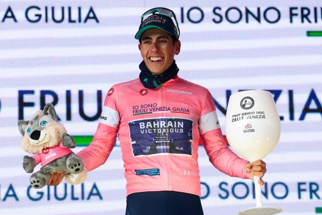 Bahrain - Victorious Portuguese rider Afonso Eulalio wearing the overall leader's pink jersey (Maglia Rosa) poses on the podium after the 7th stage of the Giro d'Italia 2026 - Tour of Italy cycling race between Formia and Blockhaus, Italy, on May 15, 2026. (Photo by Luca Bettini / AFP)