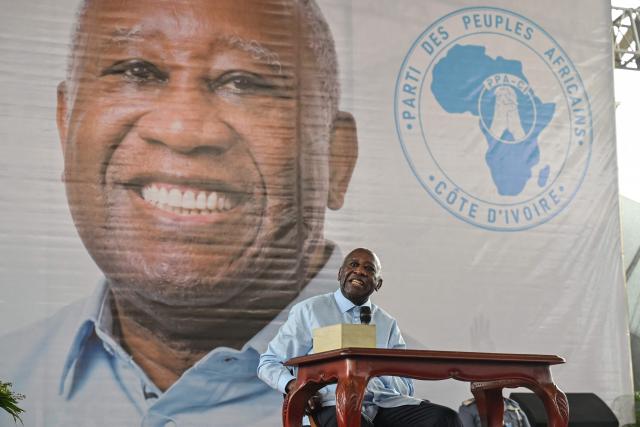 Former Ivorian President and Chairman of the African People's Party of Ivory Coast (PPA-CI) Laurent Gbagbo reacts during the closing ceremony of his Party's first Congress in Abidjan on May 15, 2026. (Photo by Issouf SANOGO / AFP)
