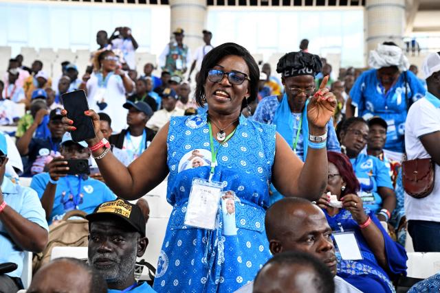 Supporters of former Ivorian President and Chairman of the African People's Party of Ivory Coast (PPA-CI) Laurent Gbagbo cheer during the Party's 1st Congress closing ceremony in Abidjan on May 15, 2026. (Photo by Issouf SANOGO / AFP)