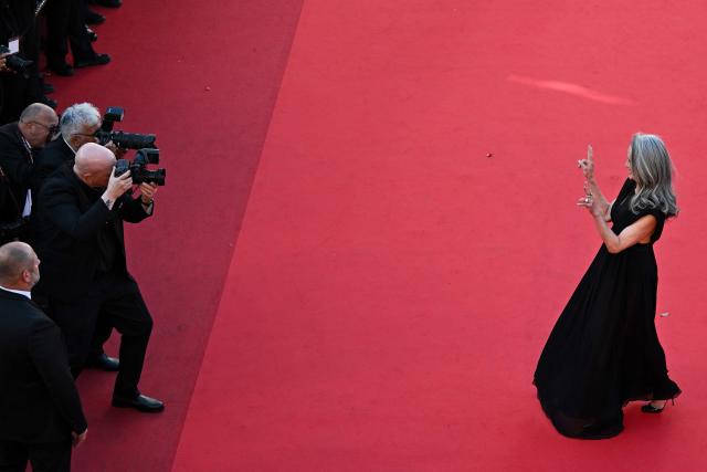 US actress Andie Macdowell arrives for the screening of the film "Karma" at the 79th edition of the Cannes Film Festival in Cannes, southern France on May 15, 2026. (Photo by Antonin THUILLIER / AFP)