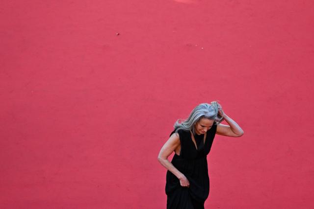 US actress Andie Macdowell arrives for the screening of the film "Karma" at the 79th edition of the Cannes Film Festival in Cannes, southern France on May 15, 2026. (Photo by Antonin THUILLIER / AFP)
