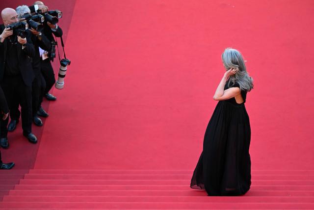 US actress Andie Macdowell arrives for the screening of the film "Karma" at the 79th edition of the Cannes Film Festival in Cannes, southern France on May 15, 2026. (Photo by Antonin THUILLIER / AFP)