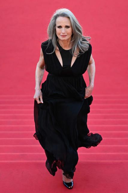 US actress Andie Macdowell arrives for the screening of the film "Karma" at the 79th edition of the Cannes Film Festival in Cannes, southern France on May 15, 2026. (Photo by Antonin THUILLIER / AFP)