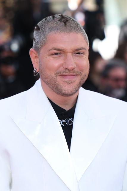 Swiss DJ Quentin Mosimann arrives for the screening of the film "Karma" at the 79th edition of the Cannes Film Festival in Cannes, southern France on May 15, 2026. (Photo by Sameer AL-DOUMY / AFP)
