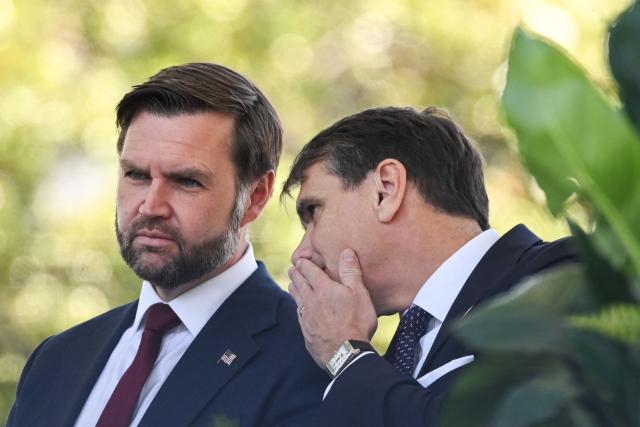 (L/R) US Vice President JD Vance and acting US Attorney General Todd Blanche attend the annual National Peace Officers' Memorial Service outside the US Capitol in Washington, DC, on May 15, 2026. The annual event honors law enforcement officers who died in the line of duty. (Photo by Alex WROBLEWSKI / AFP)