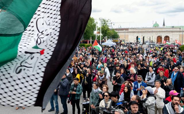 Participants attend a pro-Palestinian demonstration under the motto 'Song Protest Vienna 2026 - No Stage for Genocide' against Israel's participation in the Eurovision Song Contest (ESC), in Vienna, Austria, on May 15, 2026. (Photo by Joe Klamar / AFP)