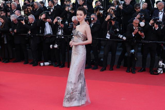 Chinese actress and singer Li Bingbing arrives for the screening of the film "Karma" at the 79th edition of the Cannes Film Festival in Cannes, southern France on May 15, 2026. (Photo by Thibaud MORITZ / AFP)