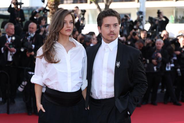 Hungarian model Barbara Palvin and US actor Dylan Sprouse arrive for the screening of the film "Karma" at the 79th edition of the Cannes Film Festival in Cannes, southern France on May 15, 2026. (Photo by Sameer AL-DOUMY / AFP)