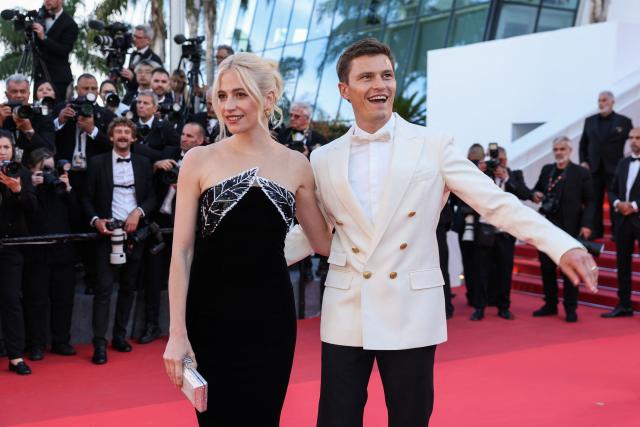 British singer Pixie Lott and British model Oliver Cheshire arrive for the screening of the film "Karma" at the 79th edition of the Cannes Film Festival in Cannes, southern France on May 15, 2026. (Photo by Thibaud MORITZ / AFP)