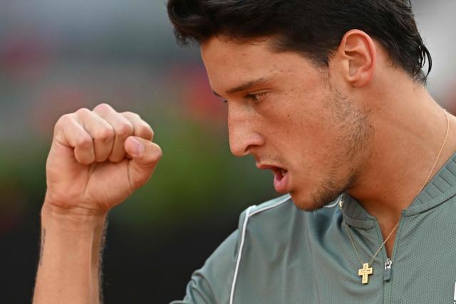 Italy's Luciano Darderi celebrates a point against Norway's Casper Ruud during their semi-final of the ATP Rome Open tennis tournament at Foro Italico in Rome on May 15, 2026. (Photo by Tiziana FABI / AFP)