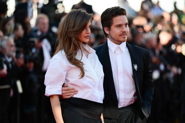 Hungarian model Barbara Palvin and US actor Dylan Sprouse arrive for the screening of the film "Karma" at the 79th edition of the Cannes Film Festival in Cannes, southern France on May 15, 2026. (Photo by Olivier CHASSIGNOLE / AFP)