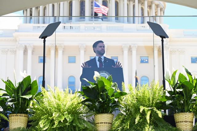 US Vice President JD Vance speaks behind bulletproof glass during the annual National Peace Officers' Memorial Service outside the US Capitol in Washington, DC, on May 15, 2026. The annual event honors law enforcement officers who died in the line of duty. (Photo by Alex WROBLEWSKI / AFP)