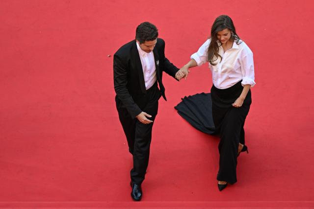 Hungarian model Barbara Palvin and US actor Dylan Sprouse arrive for the screening of the film "Karma" at the 79th edition of the Cannes Film Festival in Cannes, southern France on May 15, 2026. (Photo by Antonin THUILLIER / AFP)