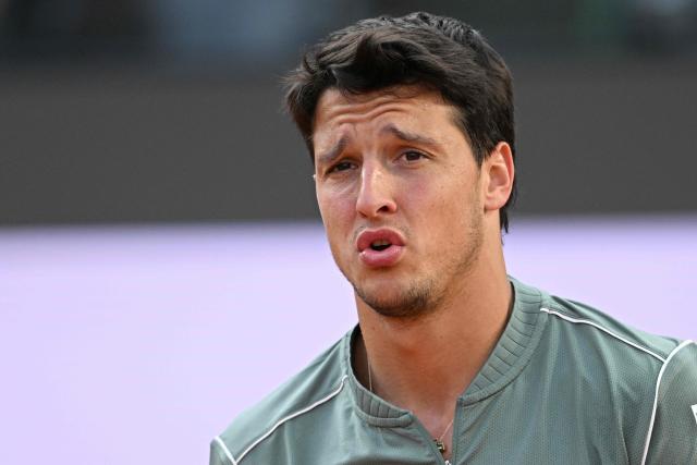 Italy's Luciano Darderi reacts during his semi-final match against Norway's Casper Ruud at the ATP Rome Open tennis tournament at Foro Italico in Rome on May 15, 2026. (Photo by Tiziana FABI / AFP)