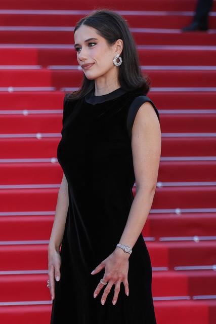 US actress Ella Bleu Travolta arrives for the screening of the film "Propeller One-Way Night Coach" at the 79th edition of the Cannes Film Festival in Cannes, southern France on May 15, 2026. (Photo by Sameer AL-DOUMY / AFP)