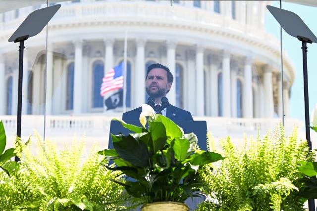 US Vice President JD Vance speaks behind bulletproof glass during the annual National Peace Officers' Memorial Service outside the US Capitol in Washington, DC, on May 15, 2026. The annual event honors law enforcement officers who died in the line of duty. (Photo by Alex WROBLEWSKI / AFP)