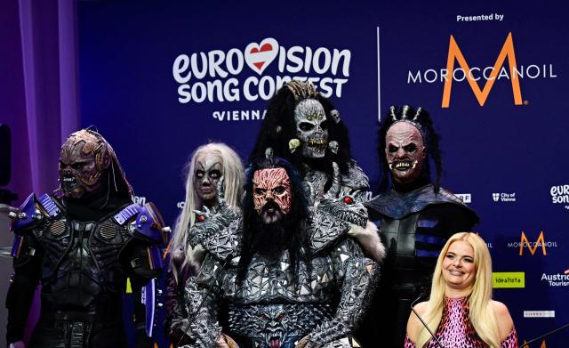(LtoR) Members of Finnish heavy metal rock band Lordi and Finnish singer Erika Vikman give a press statement in Vienna, Austria on May 15, 2026, prior to the dress rehearsal for the ESC grand finale. (Photo by Tobias SCHWARZ / AFP)