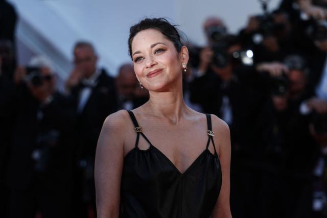 French actress Marion Cotillard arrives for the screening of the film "Karma" at the 79th edition of the Cannes Film Festival in Cannes, southern France on May 15, 2026. (Photo by Sameer AL-DOUMY / AFP)