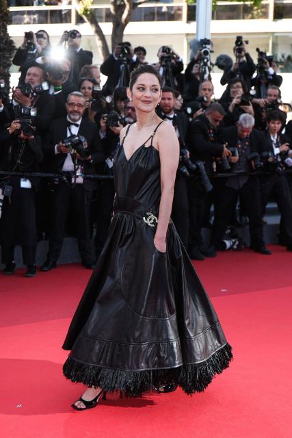 French actress Marion Cotillard arrives for the screening of the film "Karma" at the 79th edition of the Cannes Film Festival in Cannes, southern France on May 15, 2026. (Photo by Sameer AL-DOUMY / AFP)