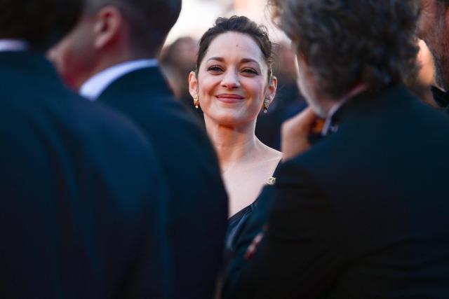 French actress Marion Cotillard arrives for the screening of the film "Karma" at the 79th edition of the Cannes Film Festival in Cannes, southern France on May 15, 2026. (Photo by Olivier CHASSIGNOLE / AFP)
