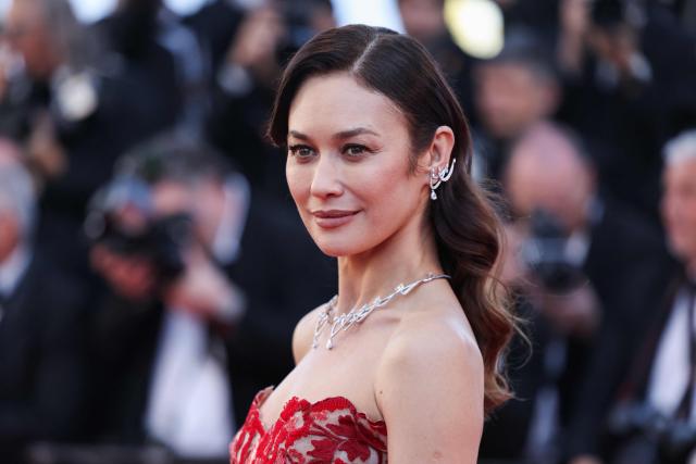 Ukrainian-French actress and former model Olga Kurylenko arrives for the screening of the film "Karma" at the 79th edition of the Cannes Film Festival in Cannes, southern France on May 15, 2026. (Photo by Thibaud MORITZ / AFP)