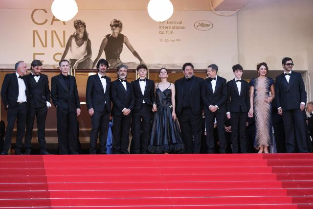 (From L) French actor Jean-Christophe Pagnac, French actor Mathieu Lourdel, French actor David Talbot, French screenwriter Simon Jacquet, Guest, Argentinian actor Leonardo Sbaraglia, French actor Marcel Canet, French actress Marion Cotillard, French actor Denis Menochet, French actor Guillaume Canet, Actor Hugo Trophardy, French actress Lucile Marquis and French composer Maxim Nucci arrive for the screening of the film "Karma" at the 79th edition of the Cannes Film Festival in Cannes, southern France on May 15, 2026. (Photo by Sameer AL-DOUMY / AFP)