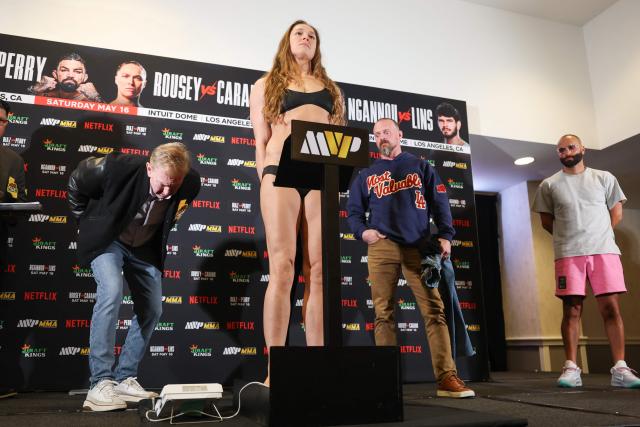 US Mixed Martial Arts (MMA) fighter Ronda Rousey weighs-in ahead of the Netflix's Rousey vs. Carano bout in Manhattan Beach, California, on May 15, 2026. Rousey will face Carano at the Intuit Dome in Inglewood, California on Saturday night. (Photo by Patrick T. Fallon / AFP)