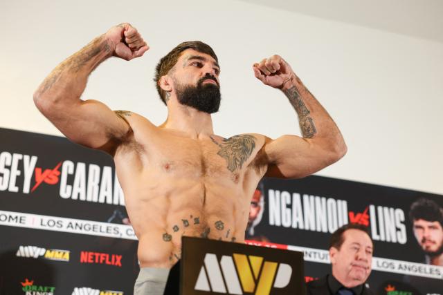 US Mixed Martial Arts (MMA) fighter Mike Perry weighs in during the official weigh-in ahead of the Most Valuable Promotions (MVP) and Netflix Professional MMA fight in Manhattan Beach, California on May 15, 2026. (Photo by Patrick T. Fallon / AFP)