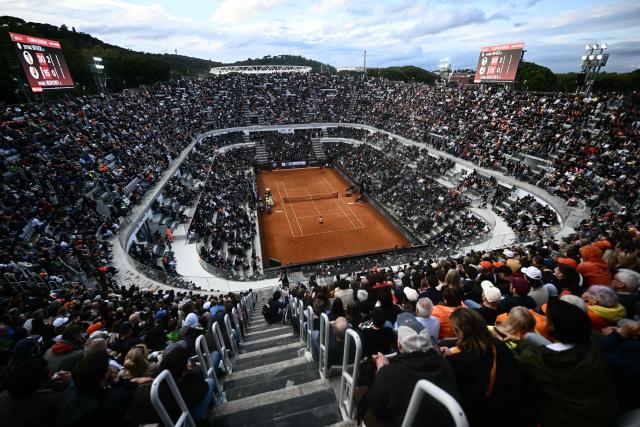 A general view shows the central court during the semi-final match between Russia's Daniil Medvedev and Italy's Jannik Sinner at the ATP Rome Open tennis tournament at Foro Italico in Rome on May 15, 2026. (Photo by Filippo MONTEFORTE / AFP)