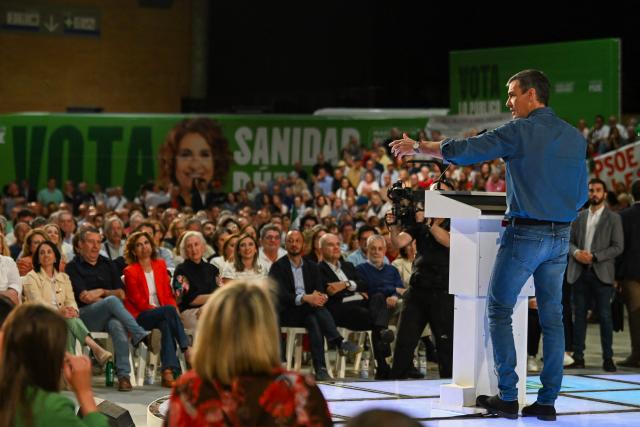 Spain's Prime Minister Pedro Sanchez delivers a speech during the Spanish Socialists Party (PSOE) closing campaign rally for Andalusia regional elections in Seville on May 15, 2026. The Socialists of Prime Minister Pedro Sanchez face a key electoral challenge May 16, 2026 in Andalusia, Spain's most populous region, following a string of defeats to the right wing a year before the general election. (Photo by CRISTINA QUICLER / AFP)
