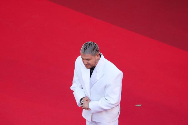 Swiss DJ Quentin Mosimann arrives for the screening of the film "Karma" at the 79th edition of the Cannes Film Festival in Cannes, southern France on May 15, 2026. (Photo by Valery HACHE / AFP)